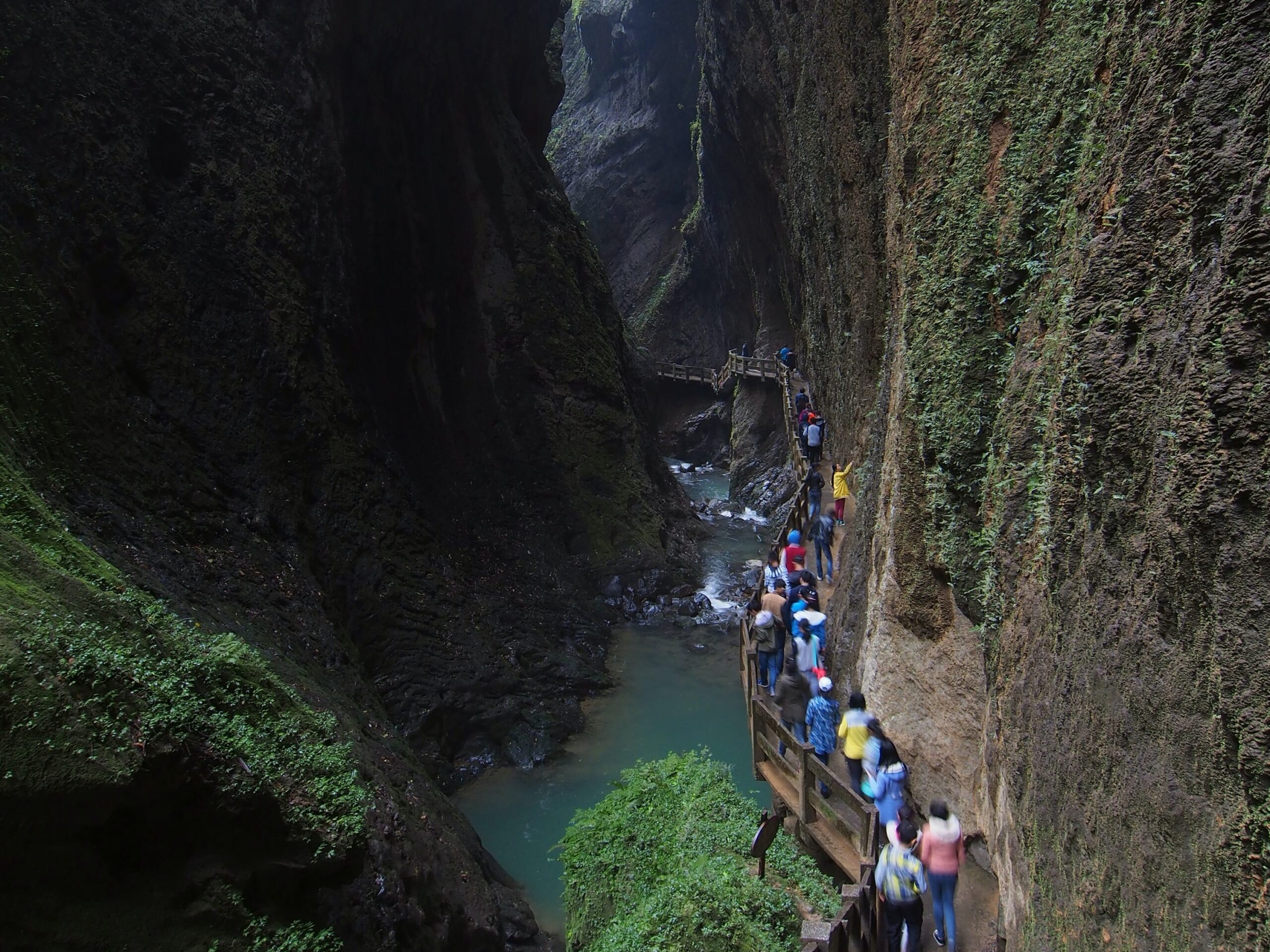 Visitors walking through Longshuixia Gap in Wulong